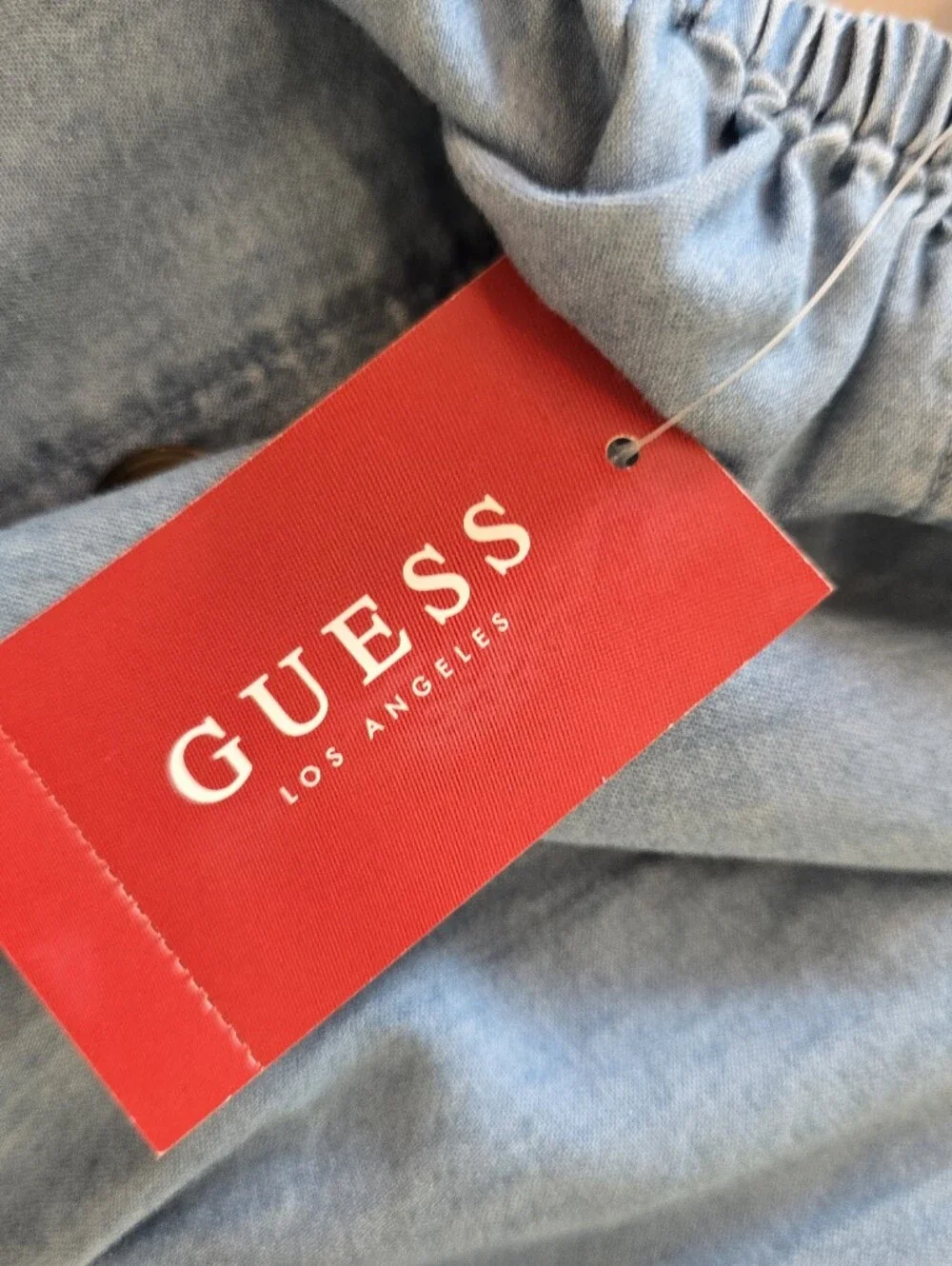 Guess breathable button light